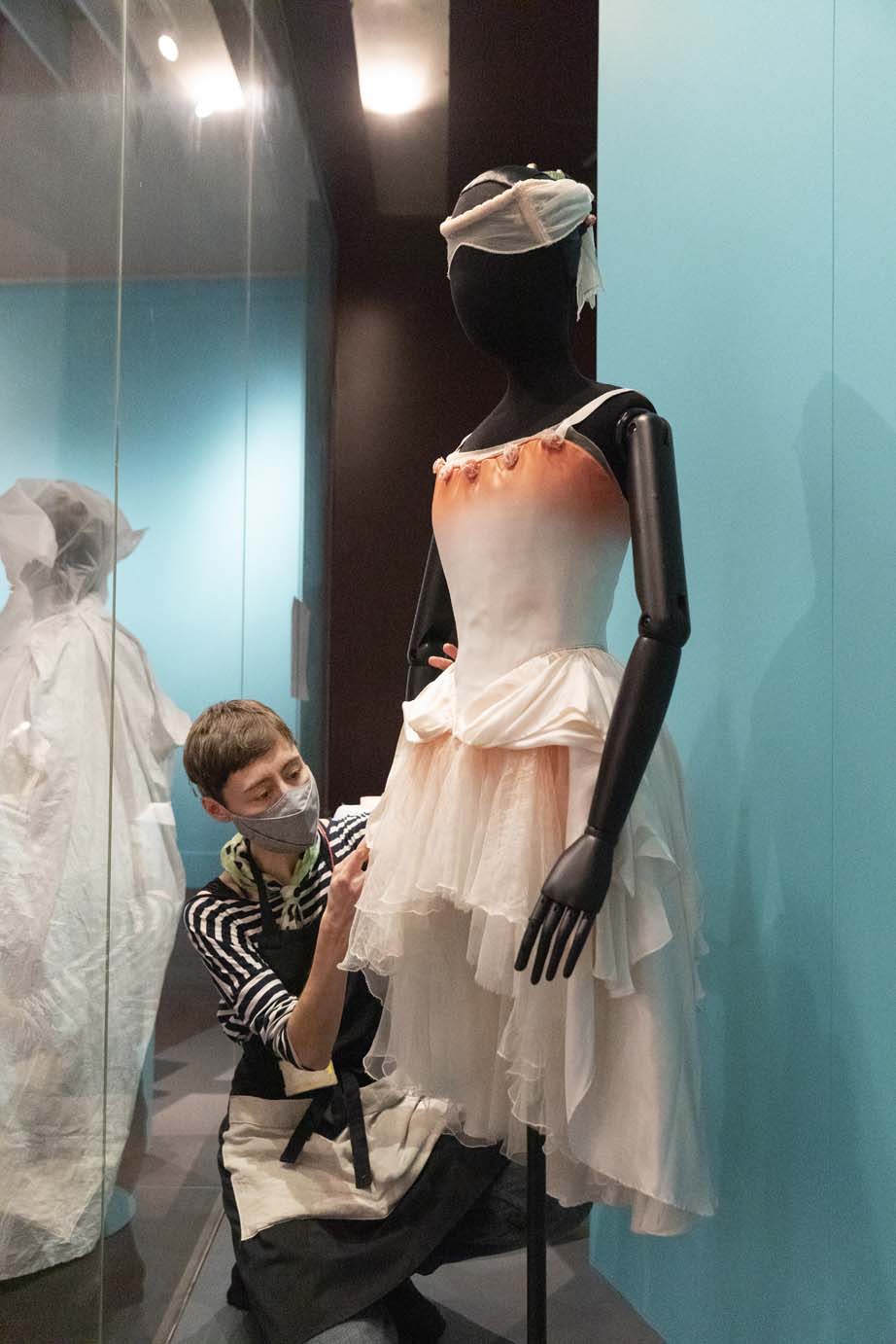 Conservator, Gesa, installing Darcey Bussell’s costume worn as Belle Rose in The Prince of the Pagodas 1989
